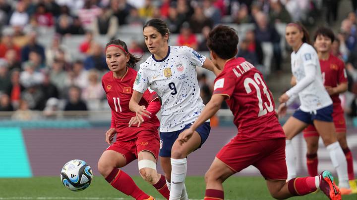 Jul 22, 2023; Auckland, NZL; USA midfielder Savannah DeMelo (9) chases the ball between Vietnam midfielder Thai Thi Thao (11) and midfielder Nguyen Thi Bich Thuy (23) in the first half of a group stage match in the 2023 FIFA Women's World Cup at Eden Park. Mandatory Credit: Jenna Watson-USA TODAY Sports Jul 22, 2023; Auckland, NZL; USA midfielder Savannah DeMelo (9) chases the ball between Vietnam midfielder Thai Thi Thao (11) and midfielder Nguyen Thi Bich Thuy (23) in the first half of a group stage match in the 2023 FIFA Women's World Cup at Eden Park. Mandatory Credit: Jenna Watson-USA TODAY Sports