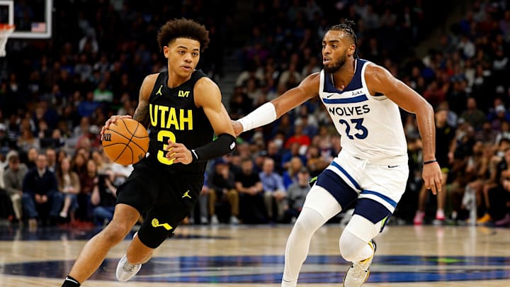 Utah Jazz v Minnesota Timberwolves, Keyontae George (3) drives against Troy Brown (23)
