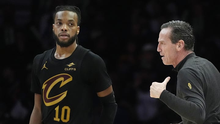 Jan 8, 2026; Minneapolis, Minnesota, USA; Cleveland Cavaliers head coach Kenny Atkinson directs guard Darius Garland (10) and the team as they play the Minnesota Timberwolves in the fourth quarter at Target Center. Mandatory Credit: Bruce Kluckhohn-Imagn Images