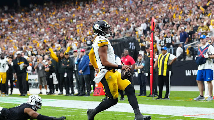 Oct 13, 2024; Paradise, Nevada, USA; Pittsburgh Steelers quarterback Justin Fields (2) scores a rushing touchdown against the Las Vegas Raiders during the second quarter at Allegiant Stadium. Mandatory Credit: Stephen R. Sylvanie-Imagn Images Oct 13, 2024; Paradise, Nevada, USA; Pittsburgh Steelers quarterback Justin Fields (2) scores a rushing touchdown against the Las Vegas Raiders during the second quarter at Allegiant Stadium. Mandatory Credit: Stephen R. Sylvanie-Imagn Images