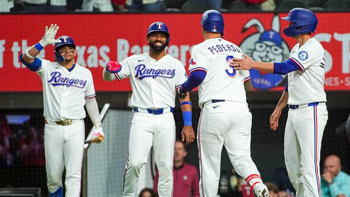 May 26, 2026; Arlington, Texas, USA; Texas Rangers designated hitter Joc Pederson (3) is greeted by catcher Kyle Higashioka (11), second baseman Ezequiel Duran (20) and left fielder Alejandro Osuna (19) after hitting a three-run home run against the Houston Astros during the first inning at Globe Life Field. Mandatory Credit: Raymond Carlin III-Imagn Images May 26, 2026; Arlington, Texas, USA; Texas Rangers designated hitter Joc Pederson (3) is greeted by catcher Kyle Higashioka (11), second baseman Ezequiel Duran (20) and left fielder Alejandro Osuna (19) after hitting a three-run home run against the Houston Astros during the first inning at Globe Life Field. Mandatory Credit: Raymond Carlin III-Imagn Images
