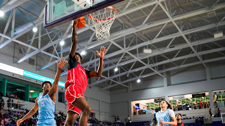Columbus Explorers guard Jaxon Richardson (5) goes up for a lay up during the first quarter of the City of Palms Classic semifinal game against the IMG Academy Ascenders at Suncoast Credit Union Arena in Fort Myers, Fla., on Saturday, Dec. 21, 2024. Columbus Explorers guard Jaxon Richardson (5) goes up for a lay up during the first quarter of the City of Palms Classic semifinal game against the IMG Academy Ascenders at Suncoast Credit Union Arena in Fort Myers, Fla., on Saturday, Dec. 21, 2024.