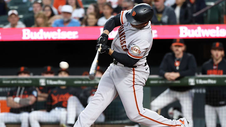 Apr 11, 2026; Baltimore, Maryland, USA; San Francisco Giants designated hitter Rafael Devers (16) hits a single during the second inning against the Baltimore Orioles at Oriole Park at Camden Yards. Mandatory Credit: Daniel Kucin Jr.-Imagn Images