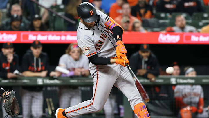 Apr 11, 2026; Baltimore, Maryland, USA; San Francisco Giants third baseman Casey Schmitt (10) singles during the fourth inning against the Baltimore Orioles at Oriole Park at Camden Yards. Mandatory Credit: Daniel Kucin Jr.-Imagn Images