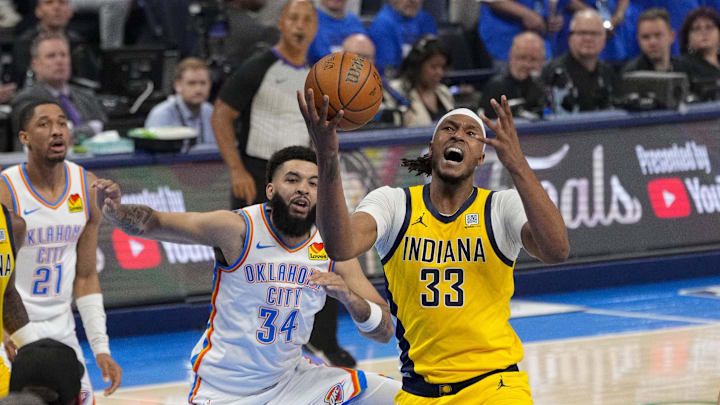 Jun 16, 2025; Oklahoma City, Oklahoma, USA; Oklahoma City Thunder forward Kenrich Williams (34) and Indiana Pacers center Myles Turner (33) battle for the loose ball during the second quarter in game five of the 2025 NBA Finals at Paycom Center. Mandatory Credit: Kyle Terada-Imagn Images Jun 16, 2025; Oklahoma City, Oklahoma, USA; Oklahoma City Thunder forward Kenrich Williams (34) and Indiana Pacers center Myles Turner (33) battle for the loose ball during the second quarter in game five of the 2025 NBA Finals at Paycom Center. Mandatory Credit: Kyle Terada-Imagn Images