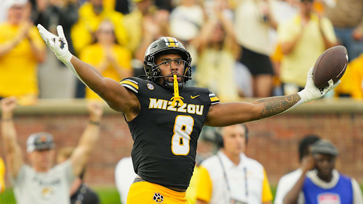 Oct 11, 2025; Columbia, Missouri, USA; Missouri Tigers defensive end Damon Wilson II (8) celebrates after recovering a fumble during the second half against the Alabama Crimson Tide at Faurot Field at Memorial Stadium. Mandatory Credit: Jay Biggerstaff-Imagn Images