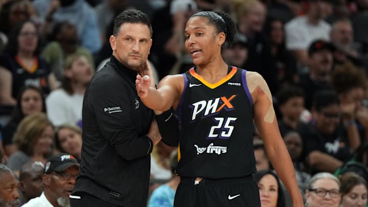 Jul 23, 2025; Phoenix, Arizona, USA; Phoenix Mercury forward Alyssa Thomas (25) talks to her had coach Nate Tibbetts after receiving a technical foul against the Atlanta Dream in the second half at Footprint Center. Mandatory Credit: Rick Scuteri-Imagn Images