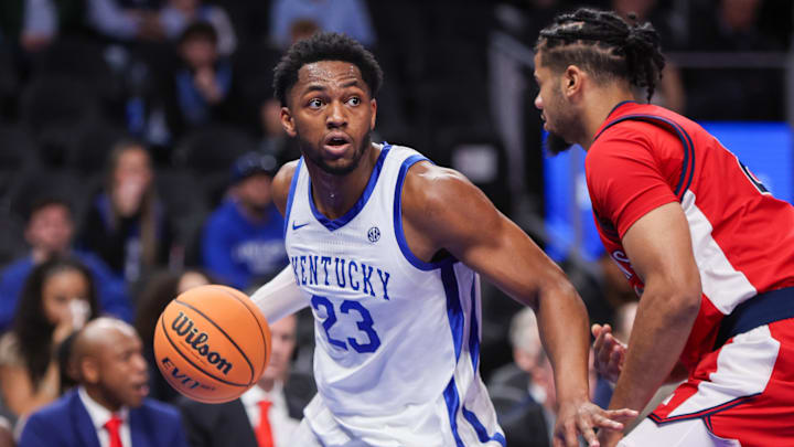 Dec 20, 2025; Atlanta, Georgia, USA; Kentucky Wildcats forward Mouhamed Dioubate (23) handles the ball against the St. John Red Storm in the first half at State Farm Arena. Mandatory Credit: Brett Davis-Imagn Images
Dec 20, 2025; Atlanta, Georgia, USA; Kentucky Wildcats forward Mouhamed Dioubate (23) handles the ball against the St. John Red Storm in the first half at State Farm Arena. Mandatory Credit: Brett Davis-Imagn Images