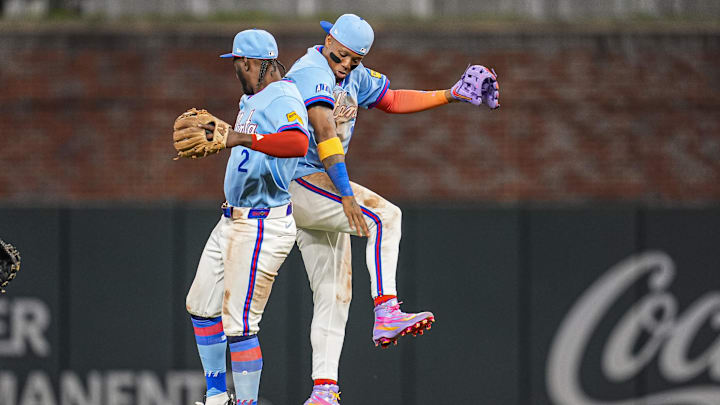 Apr 12, 2026; Cumberland, Georgia, USA; Atlanta Braves right fielder Ronald Acuna Jr. (13) and shortstop Jorge Mateo (2) react after defeating the Cleveland Guardians at Truist Park. Mandatory Credit: Dale Zanine-Imagn Images Apr 12, 2026; Cumberland, Georgia, USA; Atlanta Braves right fielder Ronald Acuna Jr. (13) and shortstop Jorge Mateo (2) react after defeating the Cleveland Guardians at Truist Park. Mandatory Credit: Dale Zanine-Imagn Images