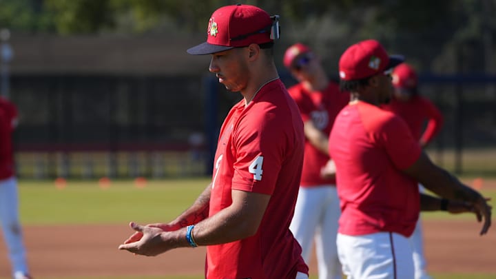 Feb 13, 2026; West Palm Beach, FL, USA;  Washington Nationals infielder Daylen Lile (4) stretched during spring training. Mandatory Credit: Jim Rassol-Imagn Images