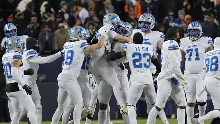 Detroit Lions place kicker Jake Bates (39) celebrates with teammates.