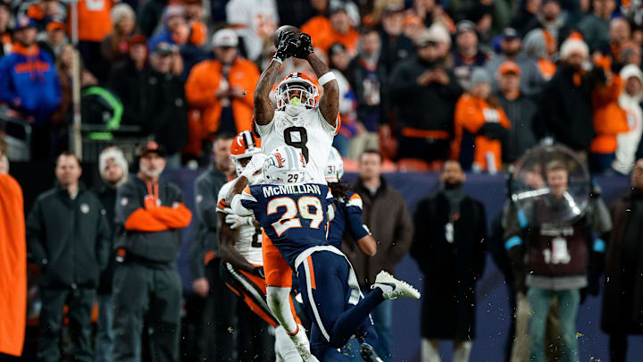 Dec 2, 2024; Denver, Colorado, USA; Cleveland Browns wide receiver Elijah Moore (8) is unable to pull in a pass against Denver Broncos cornerback Ja'Quan McMillian (29) in the fourth quarter at Empower Field at Mile High