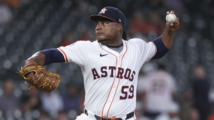 Aug 27, 2025; Houston, Texas, USA; Houston Astros starting pitcher Framber Valdez (59) delivers a pitch during the first inning against the Colorado Rockies at Daikin Park. Mandatory Credit: Troy Taormina-Imagn Images