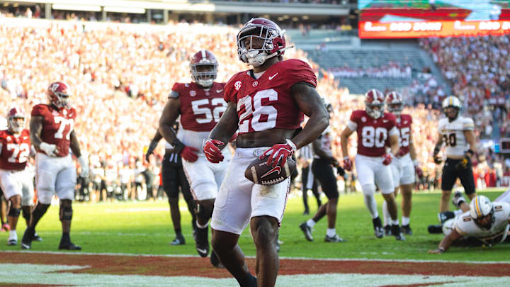 Oct 26, 2024; Tuscaloosa, Alabama, USA;  Alabama Crimson Tide running back Jam Miller (26) scores a touchdown against the Missouri Tigers during the second quarter at Bryant-Denny Stadium. Mandatory Credit: Will McLelland-Imagn Images
