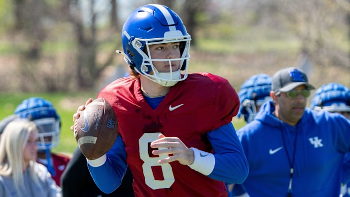 University of Kentucky quarterback Cutter Boley looks for an open pass during spring football practice on Saturday, April 6, 2024.