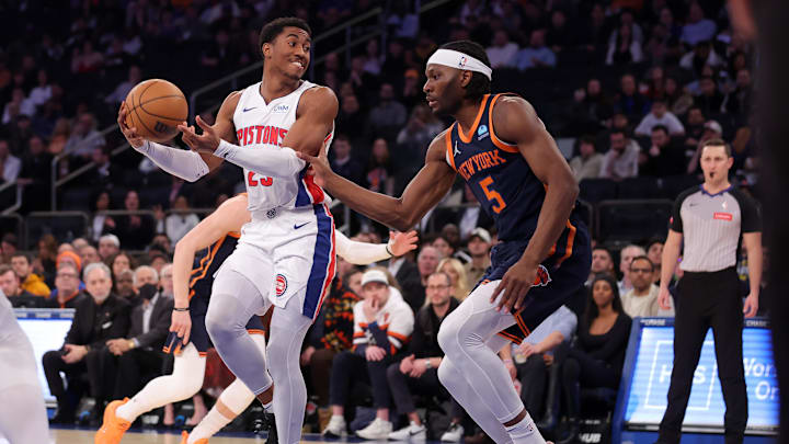 Feb 26, 2024; New York, New York, USA; Detroit Pistons guard Jaden Ivey (23) looks to pass the ball against New York Knicks forward Precious Achiuwa (5) during the first quarter at Madison Square Garden. Mandatory Credit: Brad Penner-Imagn Images