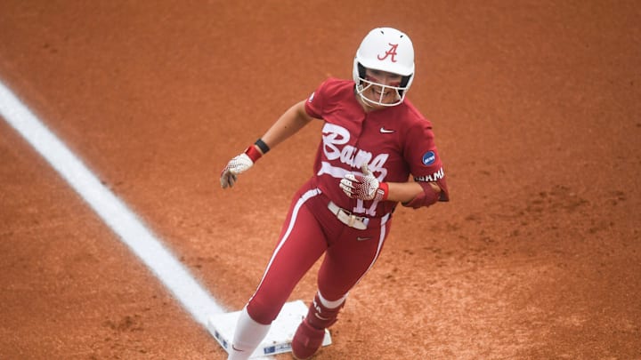 Alabama catcher Riley Valentine (17) runs home after hitting a grand slam during an NCAA super regional game between Tennessee and Alabama at Sherri Parker Lee Stadium in Knoxville, TN, Sunday, May 26, 2024.