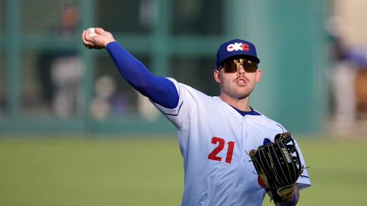 Oklahoma City's Dalton Rushing (21) warms up before a baseball game between the Oklahoma City Baseball Club and the Round Rock Express at the Chickasaw Bricktown Ballpark in Oklahoma City, Wednesday, Aug. 7, 2024.