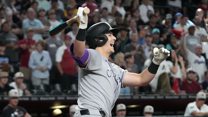 May 18, 2025; Phoenix, Arizona, USA; Colorado Rockies outfielder Jordan Beck (27) reacts after missing a pitch against the Arizona Diamondbacks in the first inning at Chase Field. Mandatory Credit: Rick Scuteri-Imagn Images