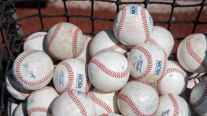 Jun 15, 2025; Omaha, Neb, USA;  Batting bag filled with baseballs before the game between the Arizona Wildcats and the Louisville Cardinals at Charles Schwab Field. Mandatory Credit: Steven Branscombe-Imagn Images