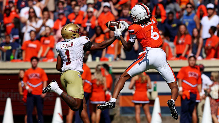 Oct 5, 2024; Charlottesville, Virginia, USA; Boston College Eagles linebacker Daveon Crouch (1) breaks up a pass intended for Virginia Cavaliers wide receiver JR Wilson (6) during the first quarter at Scott Stadium. Mandatory Credit: Peter Casey-Imagn Images