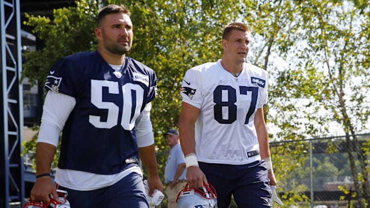 Jul 28, 2016; Foxboro, MA, USA; New England Patriots defensive end Rob Ninkovich (50) and tight end Rob Gronkowski (87) take the field for training camp at Gillette Stadium. Mandatory Credit: Winslow Townson-Imagn Images Jul 28, 2016; Foxboro, MA, USA; New England Patriots defensive end Rob Ninkovich (50) and tight end Rob Gronkowski (87) take the field for training camp at Gillette Stadium. Mandatory Credit: Winslow Townson-Imagn Images