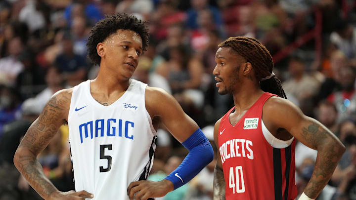 Orlando Magic forward Paolo Banchero talks to Houston Rockets forward Trhae Mitchell during an NBA Summer League game. Orlando Magic forward Paolo Banchero talks to Houston Rockets forward Trhae Mitchell during an NBA Summer League game.