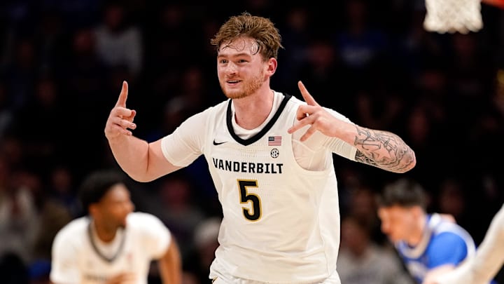 Vanderbilt forward Tyler Nickel (5) celebrates a three-point basket against Kentucky during the first half at Memorial Gymnasium in Nashville, Tenn., Tuesday, Jan. 27, 2026. Vanderbilt forward Tyler Nickel (5) celebrates a three-point basket against Kentucky during the first half at Memorial Gymnasium in Nashville, Tenn., Tuesday, Jan. 27, 2026.