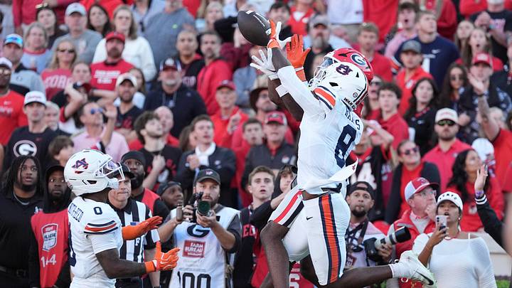 Oct 17, 2026; Athens, Georgia, USA; Auburn defensive back Kaleb Harris (8) knocks the ball away from Georgia wide receiver Craig Dandridge Jr. (81) during the third quarter at Sanford Stadium. Mandatory Credit: Dale Zanine-Imagn Images Oct 17, 2026; Athens, Georgia, USA; Auburn defensive back Kaleb Harris (8) knocks the ball away from Georgia wide receiver Craig Dandridge Jr. (81) during the third quarter at Sanford Stadium. Mandatory Credit: Dale Zanine-Imagn Images