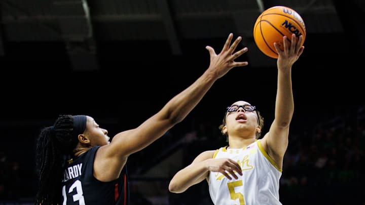 Notre Dame guard Olivia Miles (5) lays the ball up during a NCAA women's basketball game between Notre Dame and Stanford at Purcell Pavilion on Thursday, Feb. 6, 2025, in South Bend. Notre Dame guard Olivia Miles (5) lays the ball up during a NCAA women's basketball game between Notre Dame and Stanford at Purcell Pavilion on Thursday, Feb. 6, 2025, in South Bend.
