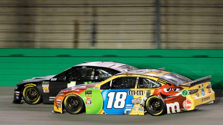 Monster Energy NASCAR Cup Series driver Kurt Busch, left, and Monster Energy NASCAR Cup Series driver Kyle Busch race against each other in the final lap Monster Energy NASCAR Cup Series driver Kurt Busch, left, and Monster Energy NASCAR Cup Series driver Kyle Busch race against each other in the final lap