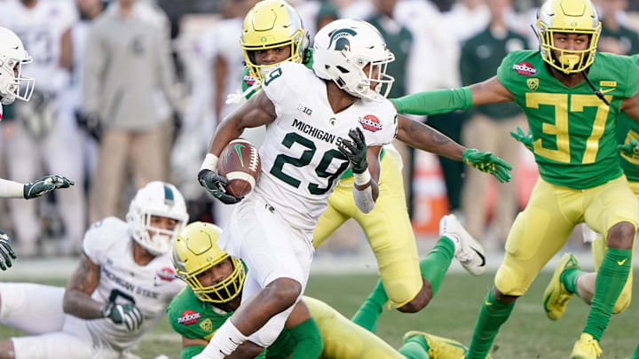 Dec 31, 2018; Santa Clara, CA, USA; Michigan State Spartans cornerback Shakur Brown (29) runs the football against the Oregon Ducks during the fourth quarter at Levi's Stadium. Mandatory Credit: Stan Szeto-USA TODAY Sports