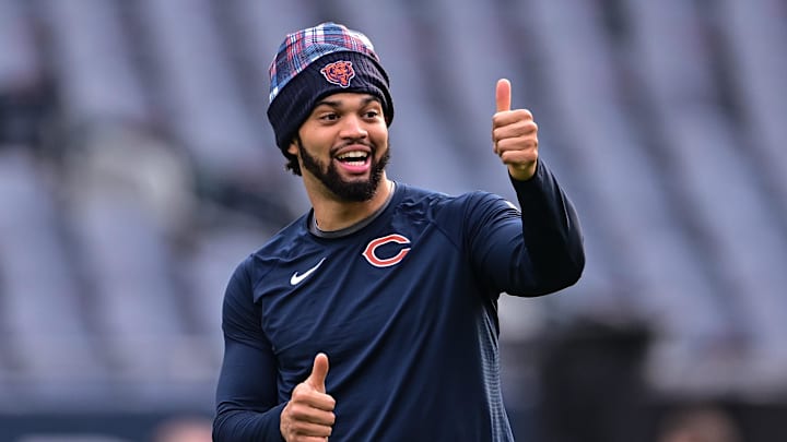 Nov 17, 2024; Chicago, Illinois, USA; Chicago Bears quarterback Caleb Williams (18) warms up before the game against the Green Bay Packers at Soldier Field. Mandatory Credit: Daniel Bartel-Imagn Images