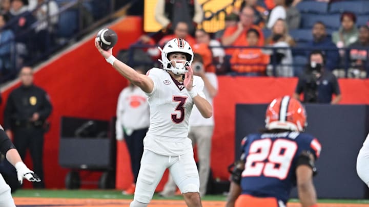 Nov 2, 2024; Syracuse, New York, USA; Virginia Tech Hokies quarterback Collin Schlee (3) throws a pass in the third quarter against the Syracuse Orange at JMA Wireless Dome. Mandatory Credit: Mark Konezny-Imagn Images