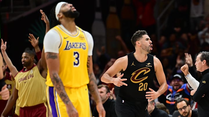 Oct 30, 2024; Cleveland, Ohio, USA; Cleveland Cavaliers forward Georges Niang (20) celebrates after hitting a three point basket as Los Angeles Lakers forward Anthony Davis (3) reacts during the second half at Rocket Mortgage FieldHouse. Mandatory Credit: Ken Blaze-Imagn Images Oct 30, 2024; Cleveland, Ohio, USA; Cleveland Cavaliers forward Georges Niang (20) celebrates after hitting a three point basket as Los Angeles Lakers forward Anthony Davis (3) reacts during the second half at Rocket Mortgage FieldHouse. Mandatory Credit: Ken Blaze-Imagn Images
