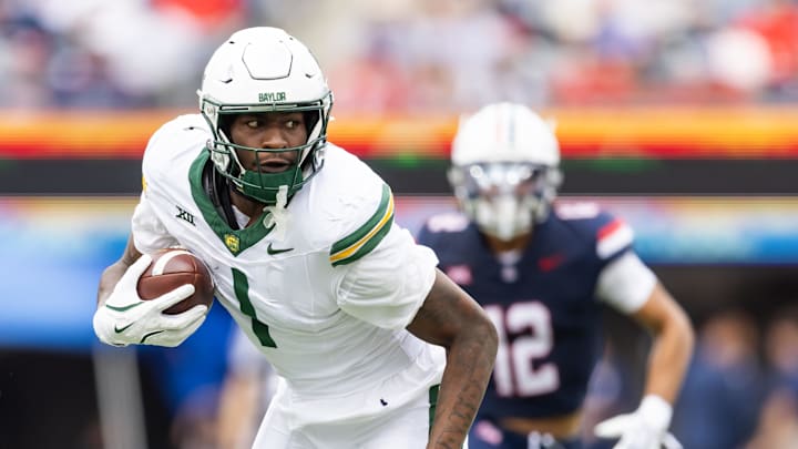 Nov 22, 2025; Tucson, Arizona, USA; Baylor Bears tight end Michael Trigg (1) against the Arizona Wildcats at Casino Del Sol Stadium. Mandatory Credit: Mark J. Rebilas-Imagn Images