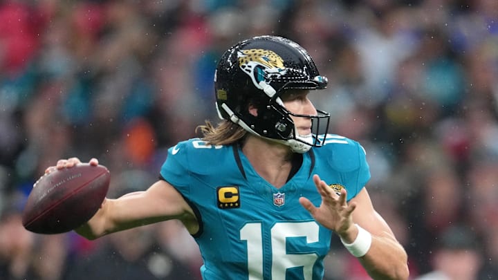 Oct 19, 2025; London, United Kingdom; Jacksonville Jaguars quarterback Trevor Lawrence (16) passes the ball against the Los Angeles Rams during the first half of an NFL International Series game at Wembley Stadium. Mandatory Credit: Kirby Lee-Imagn Images