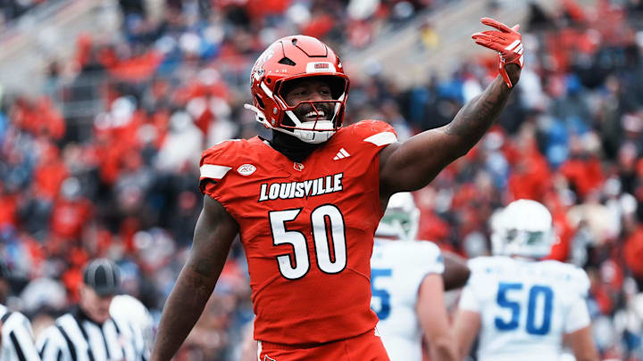 Louisville Cardinals defensive lineman Clev Lubin (50) celebrates his sack of Kentucky Wildcats quarterback Cutter Boley (8) in the first half Saturday, November 29, 2025 in Louisville, Kentucky at L&N Federal Credit Union Stadium.