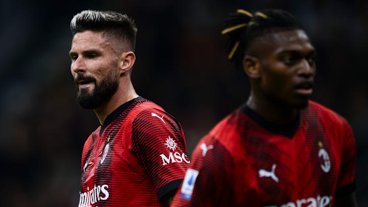Olivier Giroud (L) and Rafael Leao of AC Milan look on...