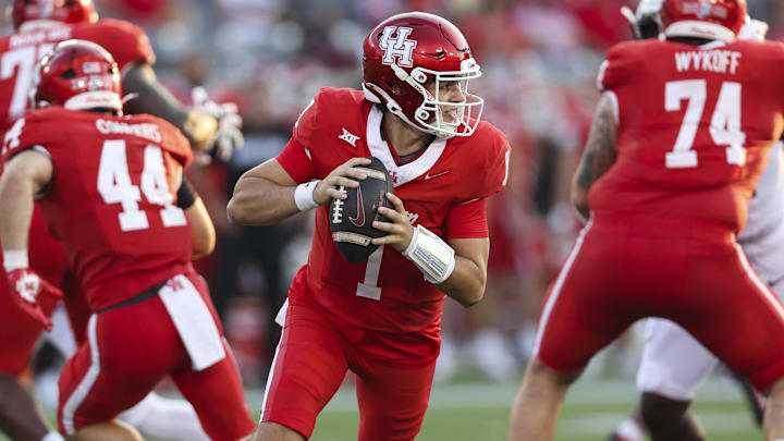 Sep 12, 2025; Houston, Texas, USA; Houston Cougars quarterback Conner Weigman (1) runs with the ball during the first quarter against the Colorado Buffaloes at TDECU Stadium. Mandatory Credit: Troy Taormina-Imagn Images Sep 12, 2025; Houston, Texas, USA; Houston Cougars quarterback Conner Weigman (1) runs with the ball during the first quarter against the Colorado Buffaloes at TDECU Stadium. Mandatory Credit: Troy Taormina-Imagn Images