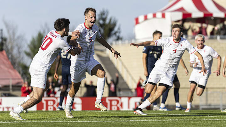 Jansen Miller (5) celebrates with Tommy Mihalic (10) and Josh Maher (4) after his golden goal sent Indiana to a 2-1 victory over Akron at Bill Armstrong Stadium on Sunday, Nov. 24, 2024. Indiana advanced to the NCAA men's soccer Sweet 16. Jansen Miller (5) celebrates with Tommy Mihalic (10) and Josh Maher (4) after his golden goal sent Indiana to a 2-1 victory over Akron at Bill Armstrong Stadium on Sunday, Nov. 24, 2024. Indiana advanced to the NCAA men's soccer Sweet 16.
