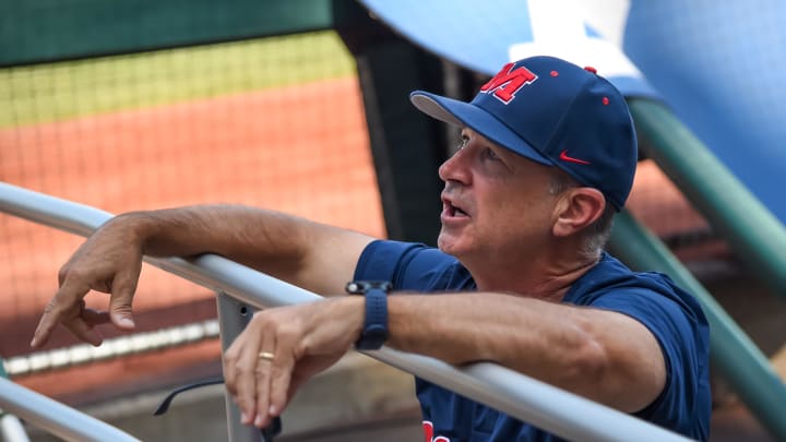 Jun 25, 2022; Omaha, NE, USA;  Ole Miss Rebels head coach Mike Bianco talks with fans before the game against the Oklahoma Sooners at Charles Schwab Field. Mandatory Credit: Steven Branscombe-USA TODAY Sports