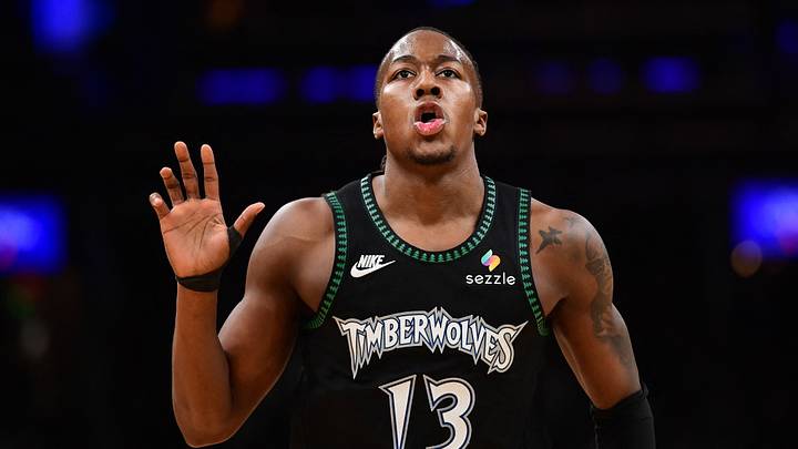 Mar 22, 2026; Boston, Massachusetts, USA; Minnesota Timberwolves guard Ayo Dosunmu (13) reacts after making a basket during the first half against the Boston Celtics at TD Garden. Mandatory Credit: Bob DeChiara-Imagn Images