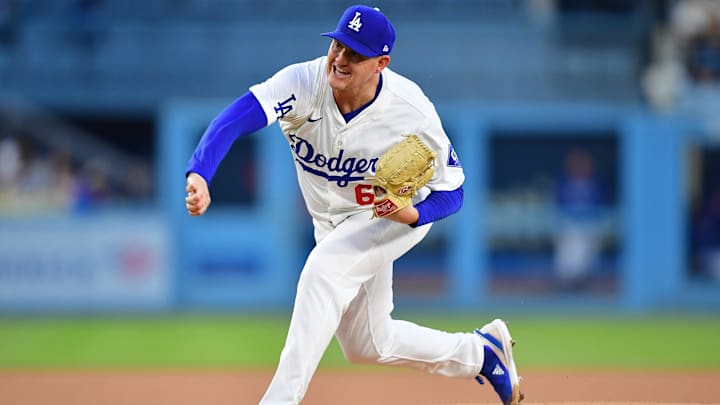 Apr 16, 2024; Los Angeles, California, USA; Los Angeles Dodgers pitcher Kyle Hurt (63) throws against the Washington Nationals during the first inning at Dodger Stadium. Mandatory Credit: Gary A. Vasquez-Imagn Images
