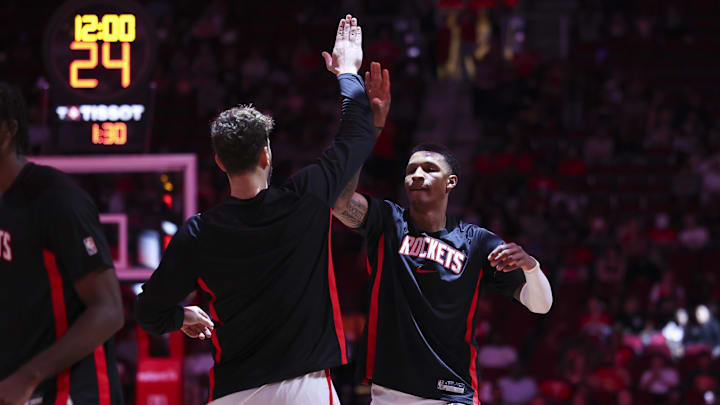 Oct 6, 2025; Houston, Texas, USA; Houston Rockets forward Jabari Smith Jr. (10) greets center Alperen Sengun (28) on the court before the game against the Atlanta Hawks at Toyota Center. Mandatory Credit: Troy Taormina-Imagn Images