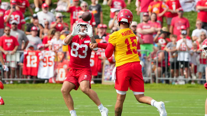 Jul 22, 2025; St. Joseph, MO, USA; Kansas City Chiefs quarterback Patrick Mahomes (15) passes to tight end Noah Gray (83) during training camp at Missouri Western State University. Mandatory Credit: Denny Medley-Imagn Images