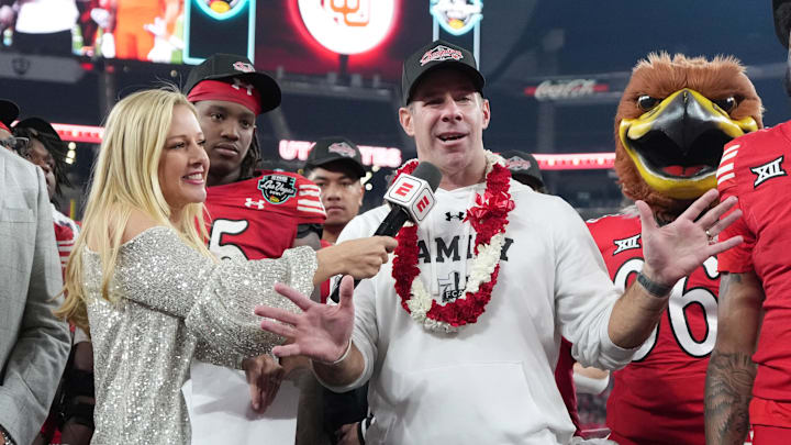 Dec 31, 2025; Las Vegas, NV, USA; Utah Utes interim coach Morgan Scalley is interviewed by ESPN reporter Dawn Davenport after victory over Nebraska Cornhuskers in the SRS Distribution Las Vegas Bowl at Allegiant Stadium. Mandatory Credit: Kirby Lee-Imagn Images