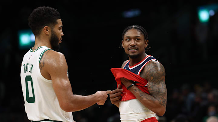 Oct 27, 2021; Boston, Massachusetts, USA; Boston Celtics forward Jayson Tatum (0) points at Washington Wizards guard Bradley Beal (3) after their game at TD Garden. Mandatory Credit: Winslow Townson-Imagn Images