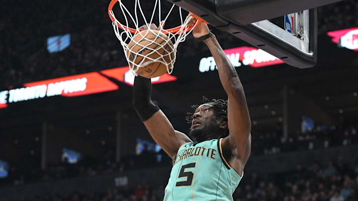 Mar 28, 2025; Toronto, Ontario, CAN;  Charlotte Hornets center Mark Williams (5) dunks for a basket against the Toronto Raptors in the second half at Scotiabank Arena. Mandatory Credit: Dan Hamilton-Imagn Images