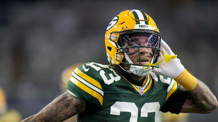 Green Bay Packers cornerback Jaire Alexander (23) reacts after intercepting a pass during the first quarter of the wild card playoff game against the Dallas Cowboys Sunday, January 14, 2024 at AT&T Stadium in Arlington, Texas.